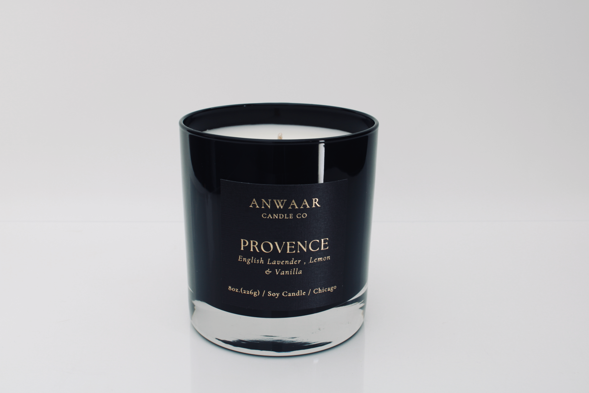 Provence - black elegant candle vessel with black label and gold letters with details about the product 