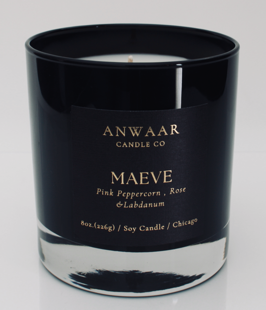  Maeve - black elegant candle vessel with black label and gold letters with details about the product